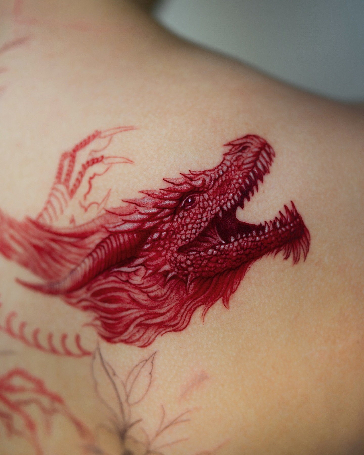 27. Intense Red Dragon Tattoo