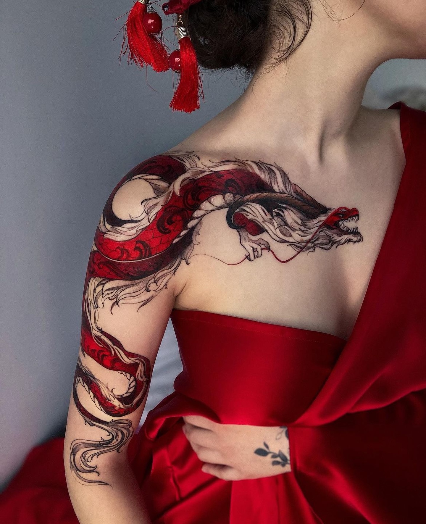 37. Title: Flowing Red Dragon Tattoo Artistry