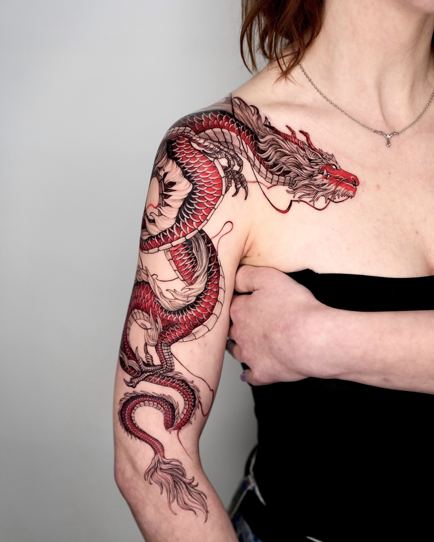 34. Vivid Chinese Dragon Tattoo with Dynamic Movement