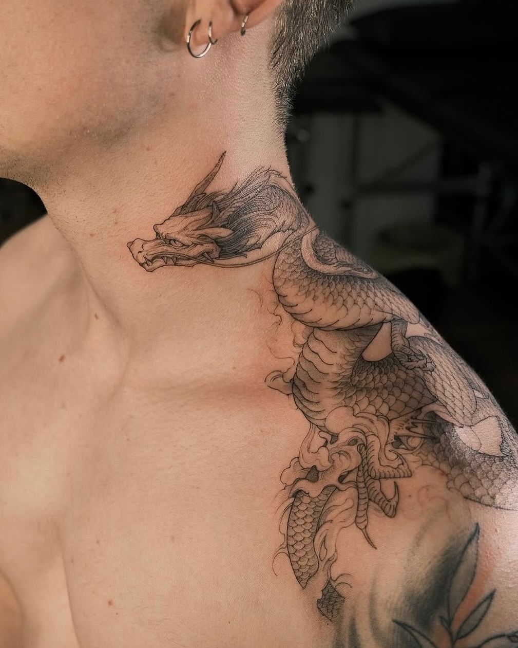 15. Dynamic Dragon Tattoo with Flowing Lines