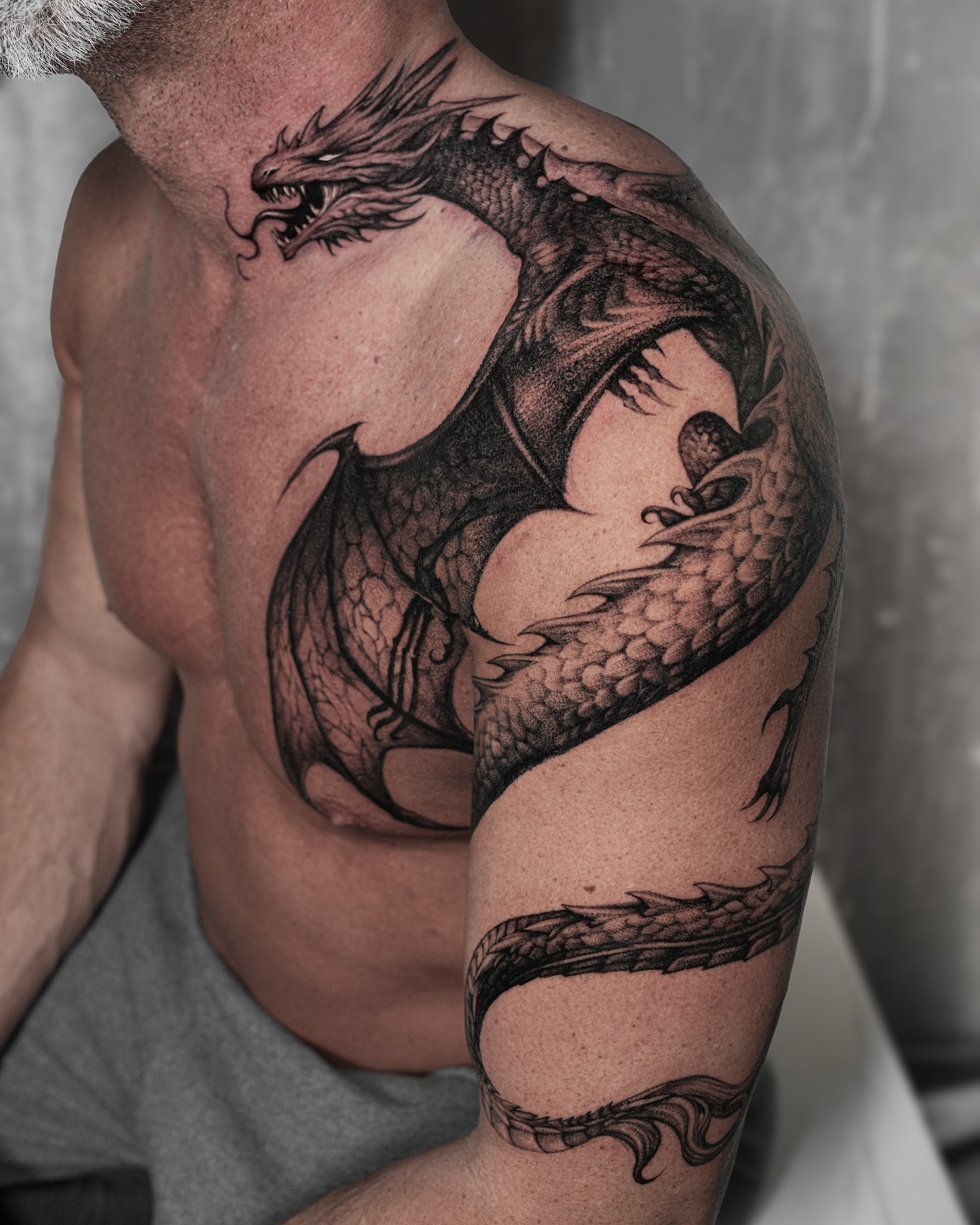 32. Intricate Black and Gray Dragon Tattoo