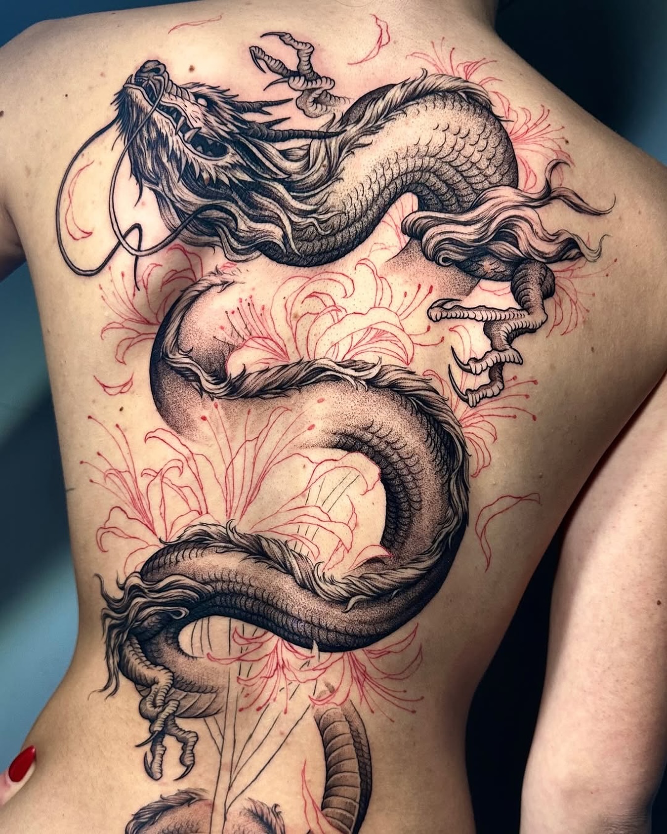 36. Intricate Dragon with Floral Elements