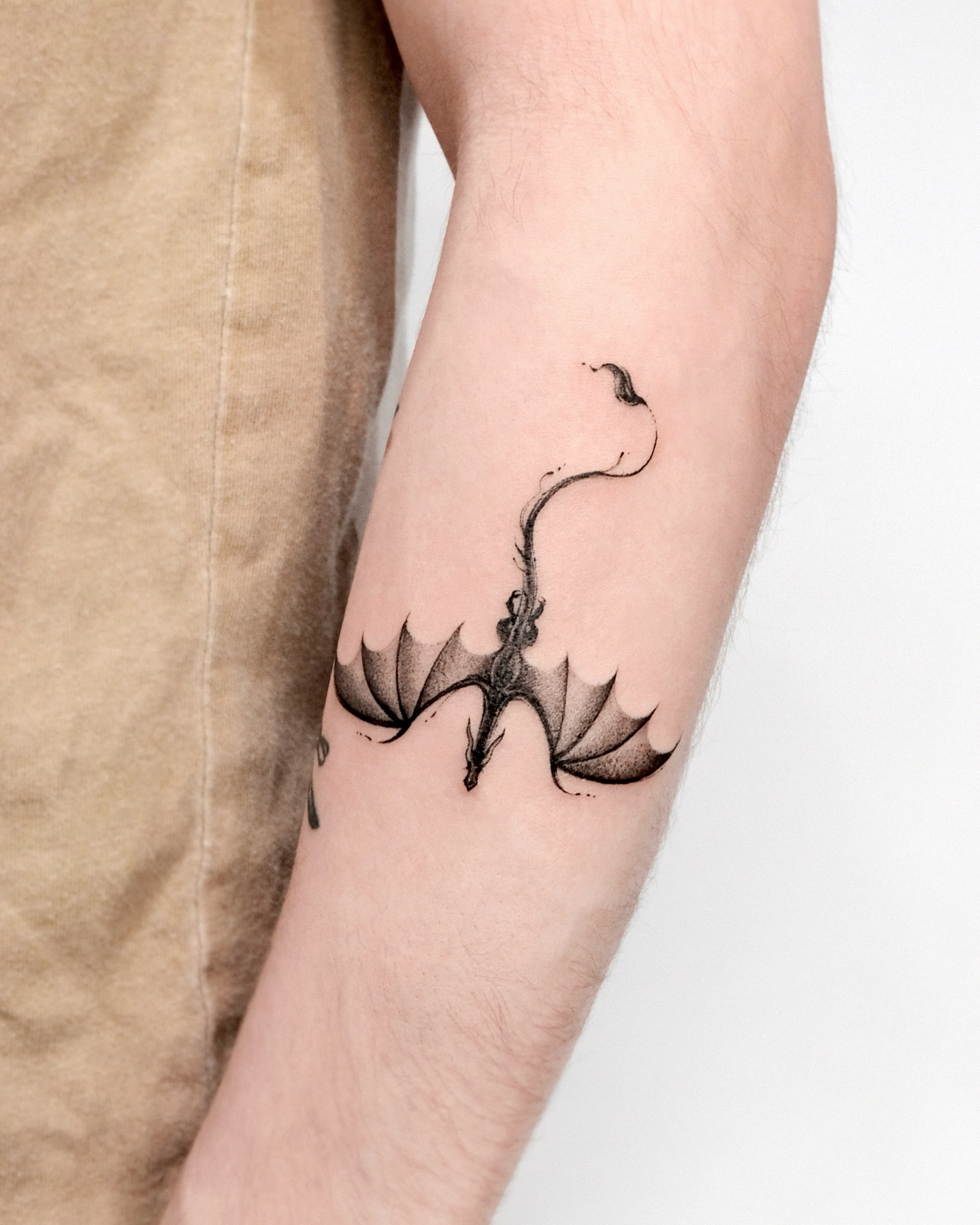 50. Intricate Black Dragon Design with Flowing Lines