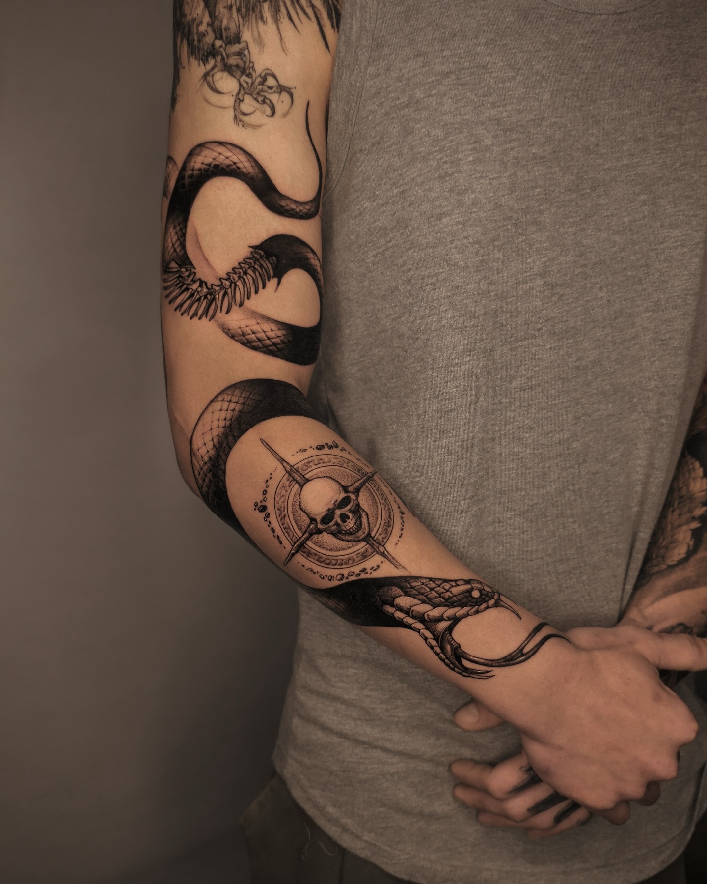 9. Venomous Whispers: the Art Of the Mesmerizing Skull Serpent Tattoo