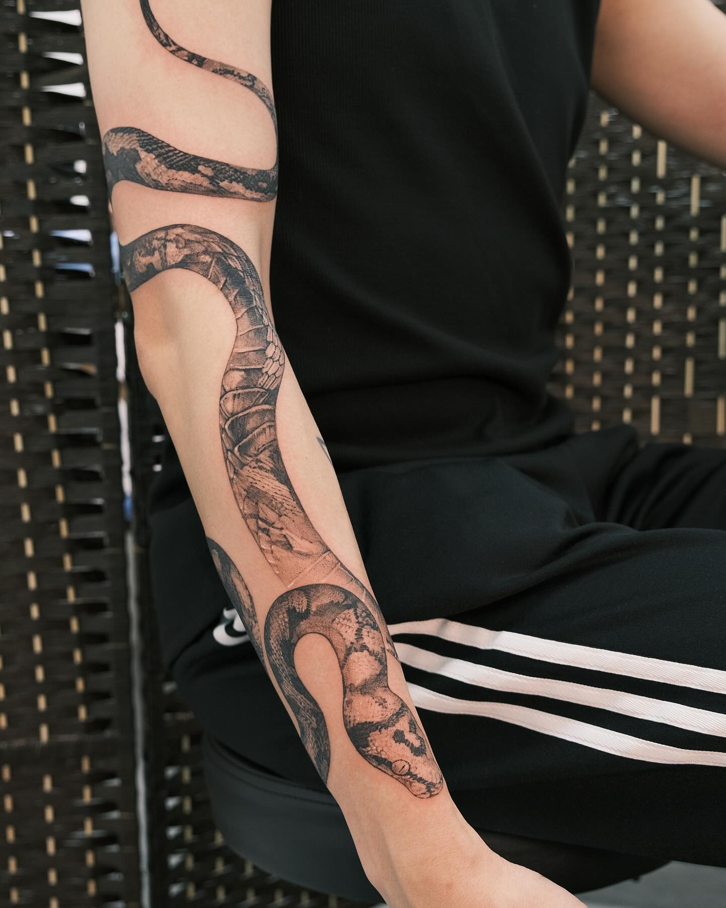 33. Serpent's Embrace: a Fluid Dance Of Ink and Skin