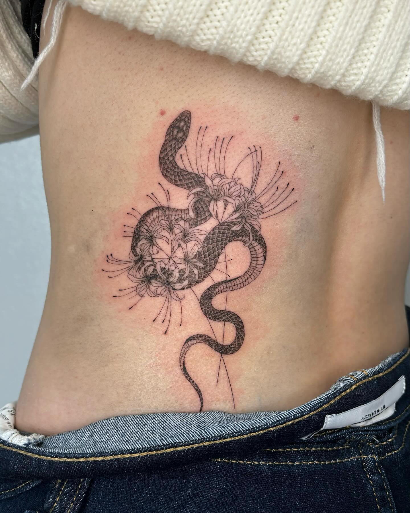 19. Intricate Elegance: the Serpent's Floral Embrace