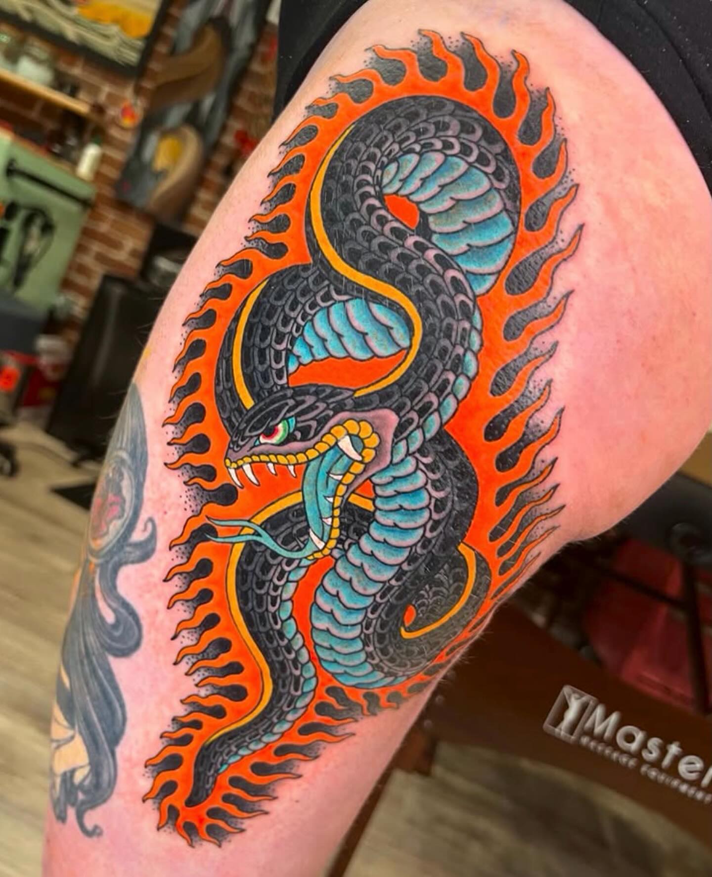 31. Fiery Serpent Embrace: a Captivating Fusion Of Myth and Bold Artistry